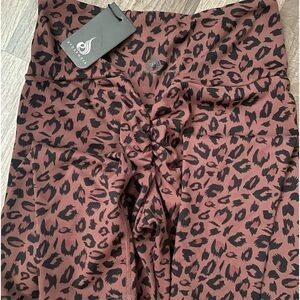 Brand new leggings with tags. Scrunched